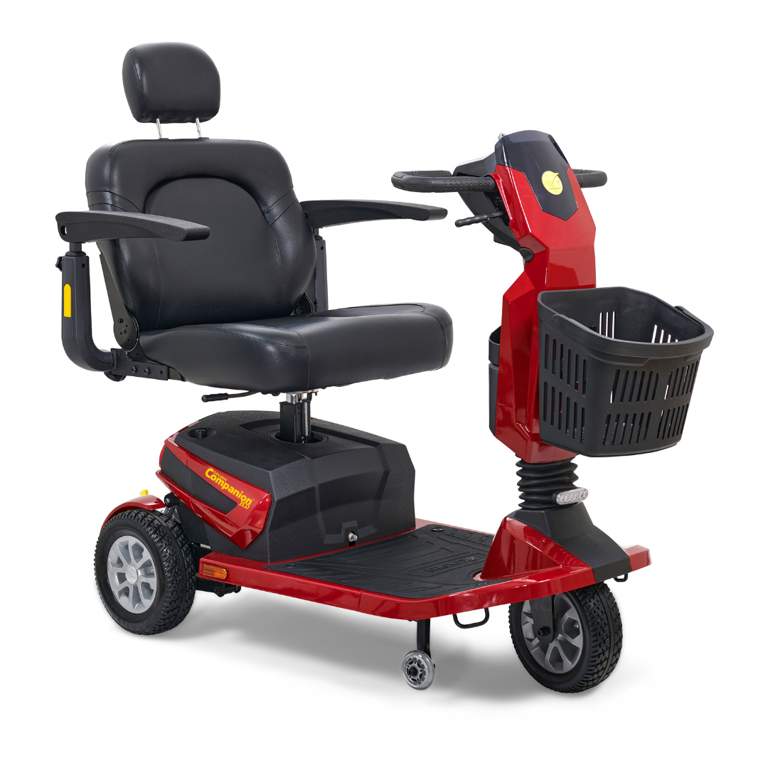 The Golden Tech Companion HD Bariatric 3-Wheel Scooter offers a sleek red design with a high-back Captains seat, armrests, and headrest. It supports up to 500 lbs., featuring convenient tiller handles and a front basket for added utility.